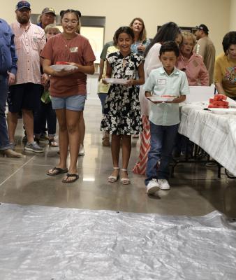 Kids watermelon seed spitting contest.