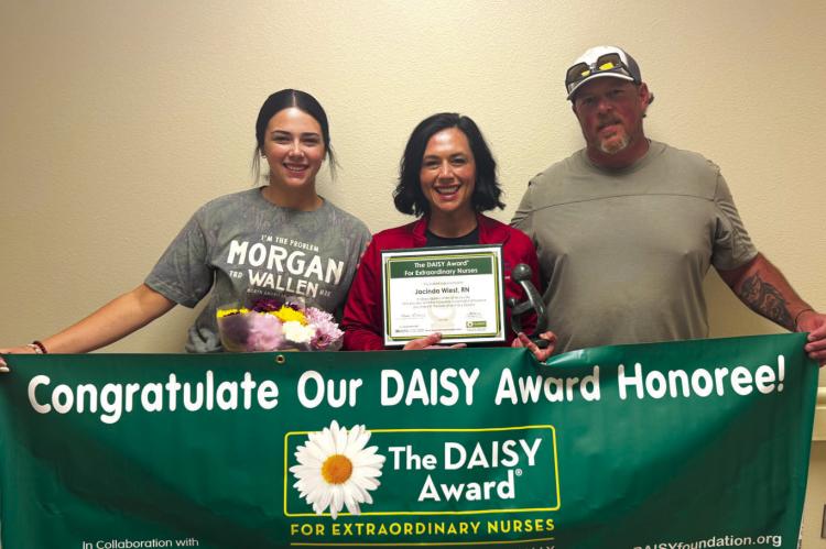 Jacinda Wiest, RN pictured center, was awarded Daisy Award through nominations from patients and coworkers. Photo courtesy of Malissa Trevino