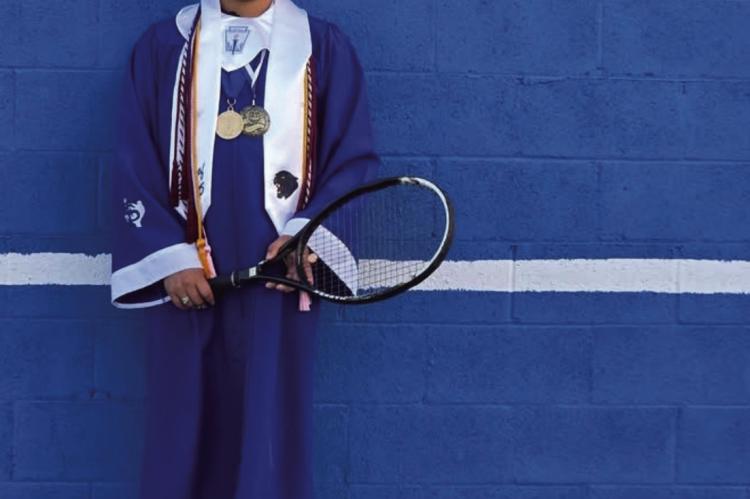 TENNIS TRADITION - Fort Stockton High School Valedictorian Alexander “Xander” Gomez poses with his tennis racket in his graduation cap and gown, continuing the Panther Tennis program’s long-standing tradition of excellence in both academics and athletics. Courtesy Photo.