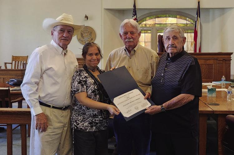 The Pecos County Historical Commission was honored with the Texas Historical Commission’s 2025 Distinguished Service Award for its efforts in local preservation. Pictured (L-R) Kirby Warnock, Veronica Diaz manager of the Old Pecos County Jail, Pecos County Judge Joe Shuster and Oscar Gonzalez, chairman of the Pecos County Historical Commission. Pioneer photo by Joh Covington