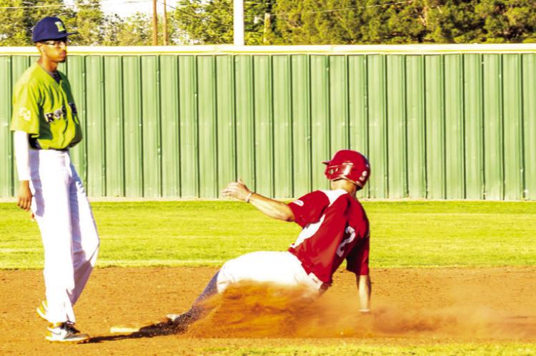 Center Fielder Cade Labruyere steals second safely in game two against Roswell. Courtesy Photo