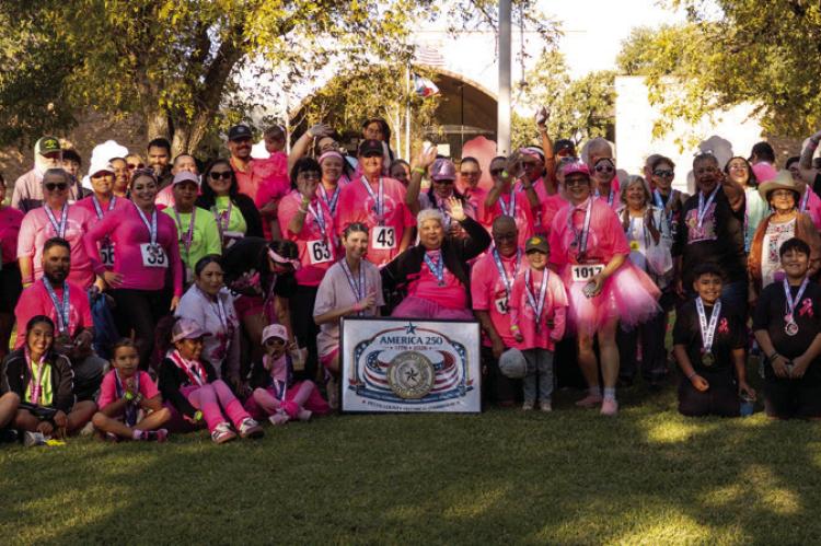 Community members gather for the Stronger Together Pink Out 5K and Expo Oct. 10 at Zero Stone Park in Fort Stockton. The annual Pink Springs fundraiser supports individuals and families impacted by breast cancer. Courtesy Photo by Laura Waddell Photography.
