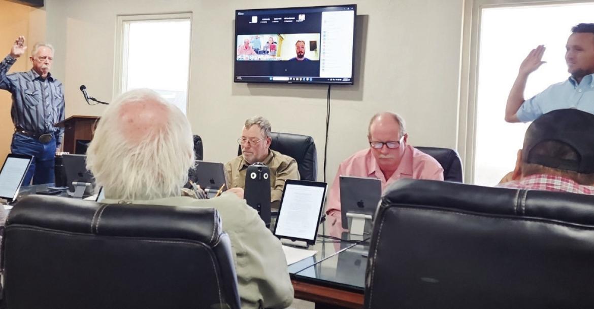 Pecos County Resident, Tommy Ezell and General Manager Ty Edwards during a sworn testimonial and protest of the water drilling permits during Tuesday, Oct. 20, Middle Pecos Groundwater Conservation District meeting. Photo by Pioneer