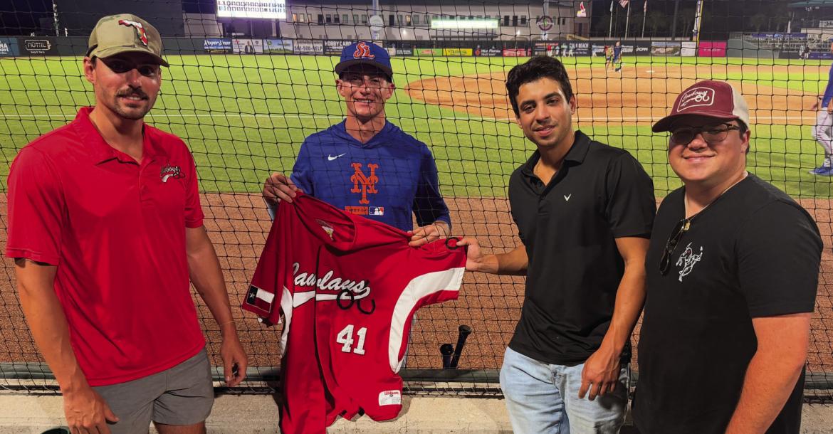 Alpine Cowboys Michael Castillo, Andres Garcia and Ethan Eibe visit 2024 Pecos League MVP Taylor Darden, second from left, at Roger Dean Chevrolet Stadium in Jupiter, Florida. Darden is continuing his professional career with the St. Lucie Mets. Courtesy photo/Alpine Cowboys Pro Baseball Club.
