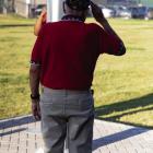 Veteran, Alonso Martinez saluting the US flag. Courtesy Photo by Zachary Gray.