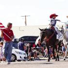 Miss Rodeo Comanche Springs Sweetheart 2023, Loretta Rivera, throws candy to paradegoers during Sunday’s 4th of July parade on Main Street. Photo by Shawn Yorks